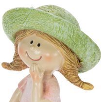 Itens Conjunto de 2 figuras decorativas de meninas com chapéus, nas cores rosa e verde, 6,5 x 5,5 x 14,5 cm.