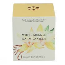 Itens Vela perfumada em vidro, baunilha e almíscar branco, 3 cm de altura, 8,5 cm de diâmetro.