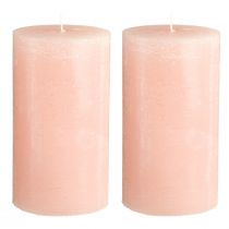 Itens Conjunto de 2 velas cilíndricas rosa, 85×150mm, cor sólida, ideais para decoração e clima romântico.