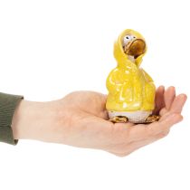 Itens Conjunto de 4 figuras de patos em cerâmica com capa de chuva, perfeitas para decorar varandas e jardins. 11 cm de altura.