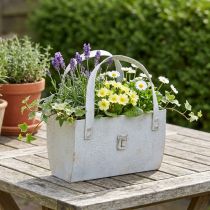 Itens Bolsa metálica, com design moderno e aconchegante, ideal para uso interno e externo, 28 cm.