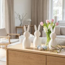 Itens Conjunto de 3 peças com 13 cm de comprimento, composto por uma estatueta decorativa de coelho com um visual plissado, ideal para decoração de interiores moderna, sala de estar ou escritório.
