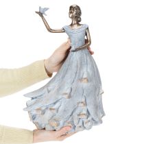 Itens Estatueta de uma mulher com um pássaro. Escultura decorativa artisticamente concebida para um design intemporal. 41 cm