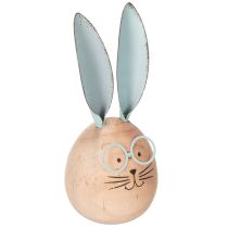 Itens Conjunto de 3 figuras decorativas de coelhos de madeira com rostinhos para dar um toque divertido a mesas e prateleiras, 14 cm de altura.