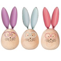 Itens Conjunto de 3 figuras decorativas de coelhos de madeira com rostinhos para dar um toque divertido a mesas e prateleiras, 14 cm de altura.