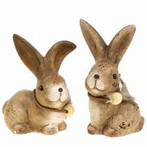 Itens Figuras decorativas coelhos com pena e conta de madeira marrom sortidas 7cm x 4,9cm A 10cm 2 unidades