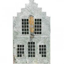 Itens Suporte metálico para vela tealight, em formato de casinha, com 25,5 cm de altura.