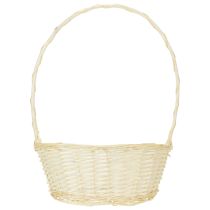 Itens Cesta de presente com aproximadamente 38 cm x 27 cm, em tom claro.
