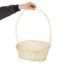 Itens Cesta de presente com aproximadamente 38 cm x 27 cm, em tom claro.