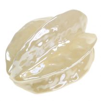 Itens Escultura decorativa de carambola em cerâmica, 14 cm de altura.