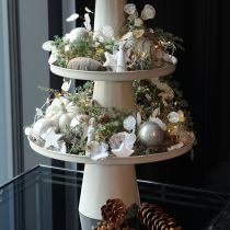 Itens Prato decorativo redondo bege com base de 40 cm de altura.