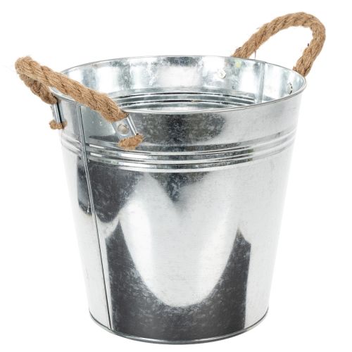 Balde de metal brilhante com