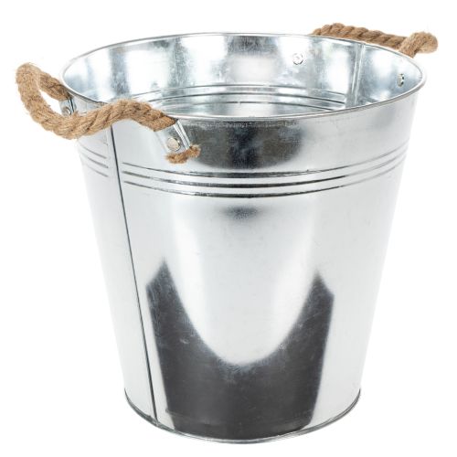 Balde de metal brilhante com