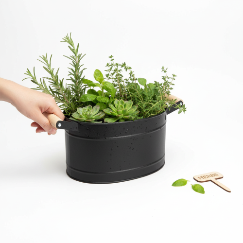 Itens Vaso oval de metal com alça, acabamento preto e natural, 34x19,5x15cm