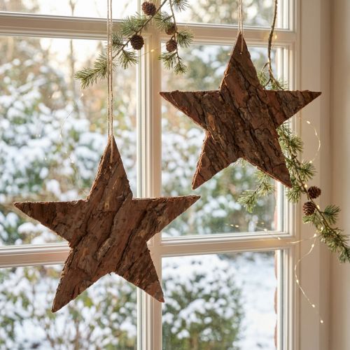 Estrelas decorativas para pendurar em casca de pinheiro Estrelas de pinheiro 20cm 3 un | Floristik24.pt