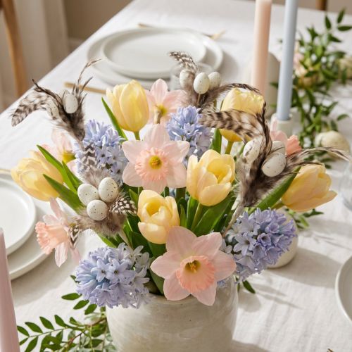 Galhos decorativos com penas