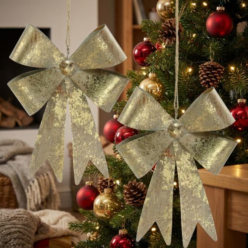 Itens Loops feitos de metal, pingente de Natal, decoração do Advento dourada, aparência antiga Alt.18 cm L12.5 cm 2 unidades