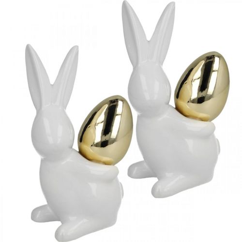 Itens Coelhos com ovo de ouro, coelhos de cerâmica para Páscoa nobre branco, dourado H13cm 2pcs