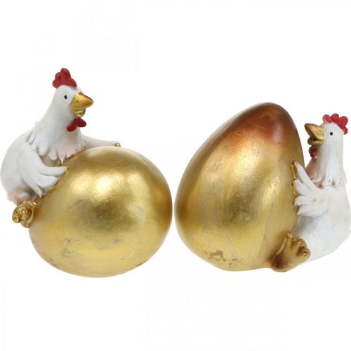 Floristik24 Galinhas decorativas com ovo de páscoa, galinhas de páscoa, ovo de ouro, decoração de páscoa H12/11cm conjunto de 2