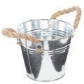 Balde de metal brilhante com