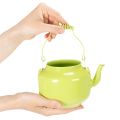 Bule decorativo usado como vaso de flores, estilo retrô nostálgico | Floristik24.pt